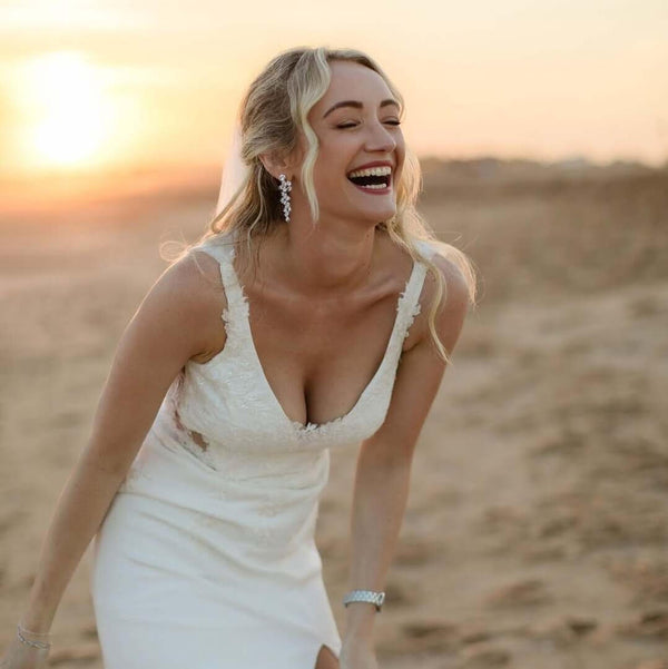 Grace wore the Cruz crystal bridal statement earrings by Aria. Photography by Matt and Lena.